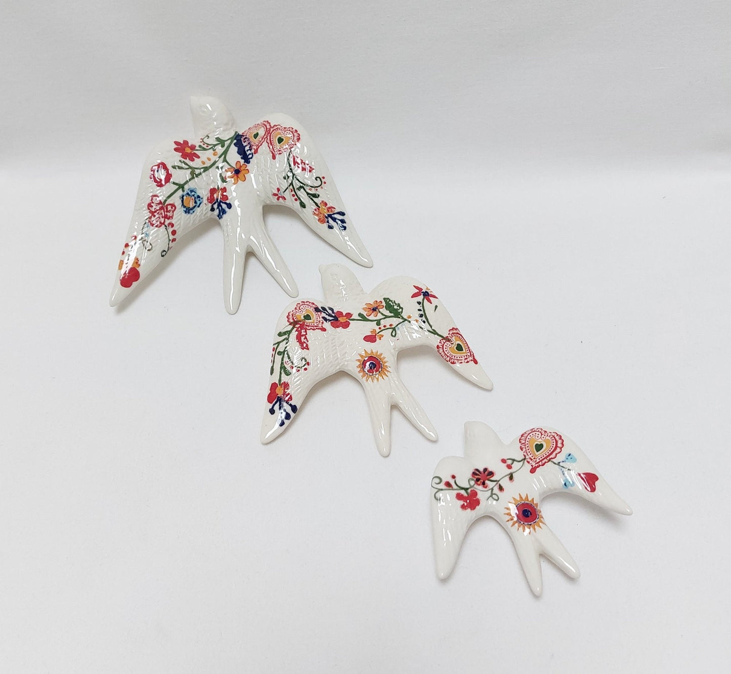 3 Decorated Ceramic Swallows